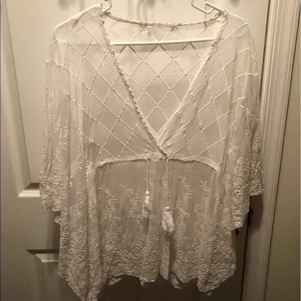 A Beautiful White Sheer Top.